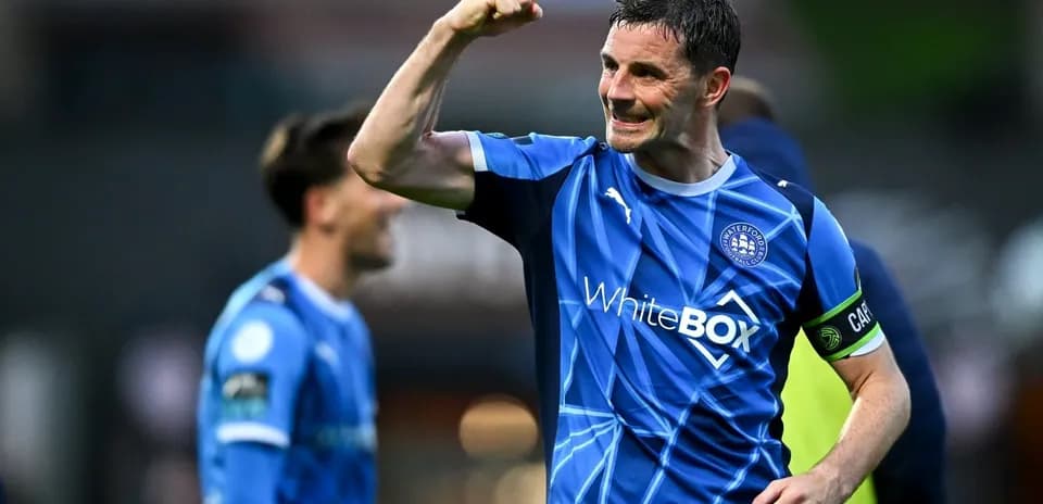Player celebrating victory with raised fist