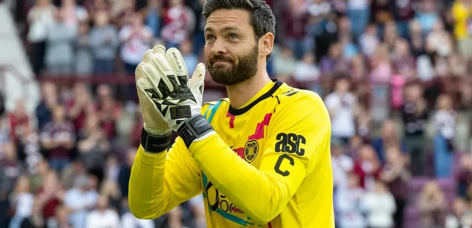 Goalkeeper applauding fans during match celebration