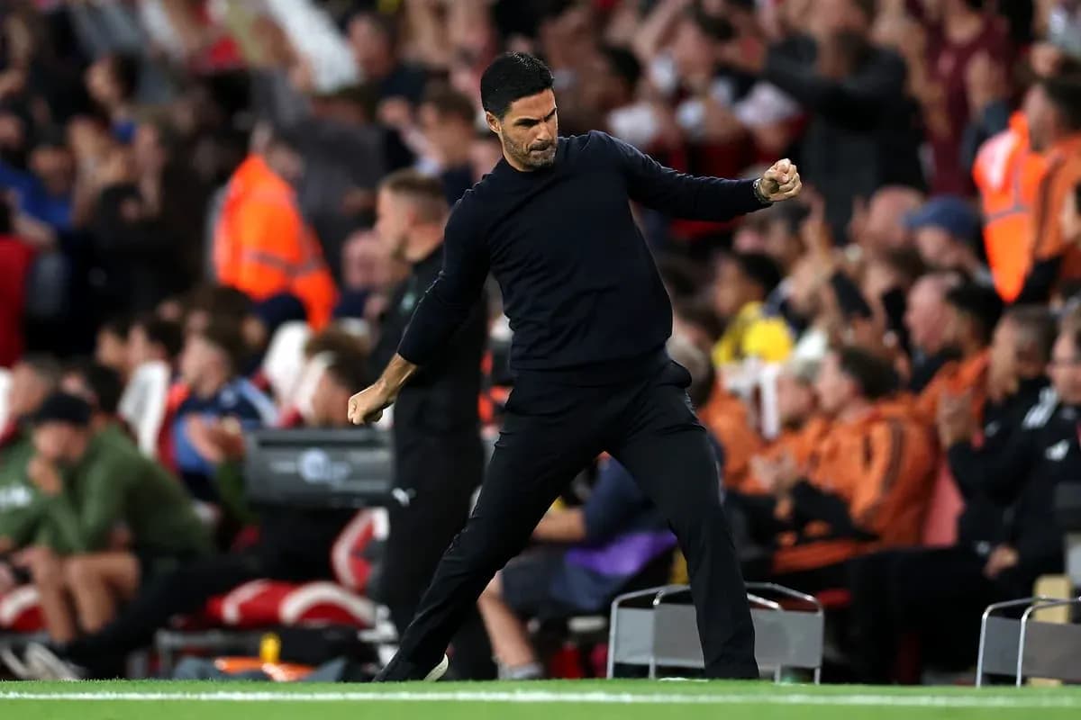 Manager celebrating during a match on the sideline
