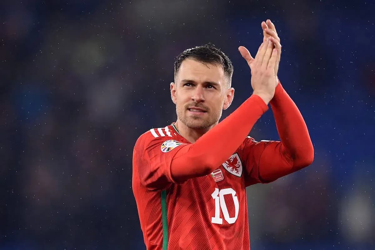 Player applauding fans after a match