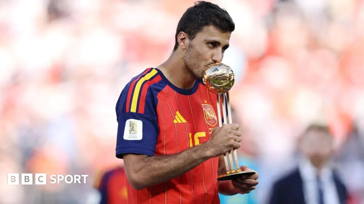 Player kissing trophy after winning tournament