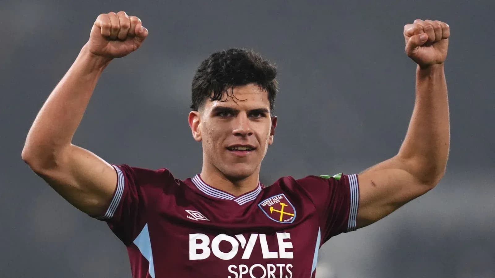 Player celebrating victory with raised fists Player celebrating victory with raised fists