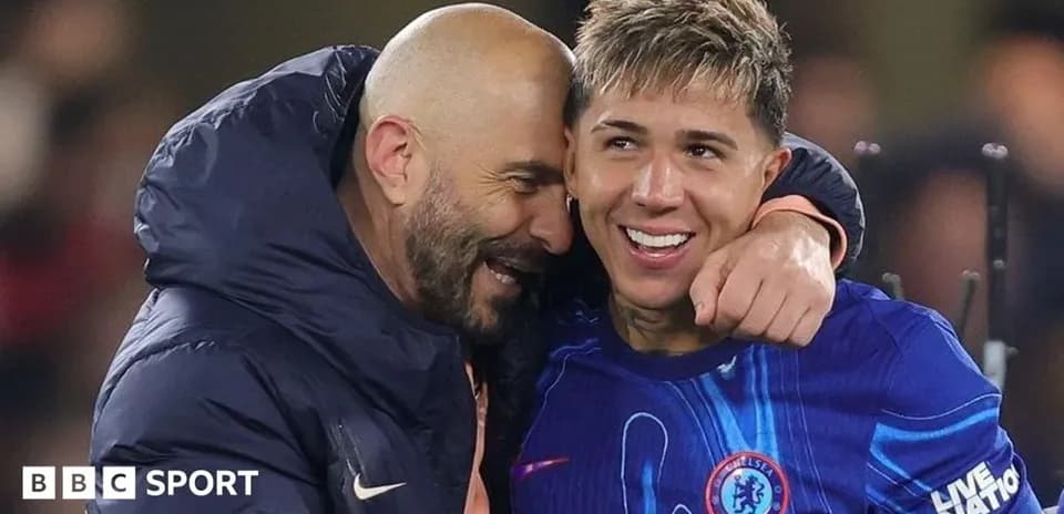 Coach celebrating with player after match victory
