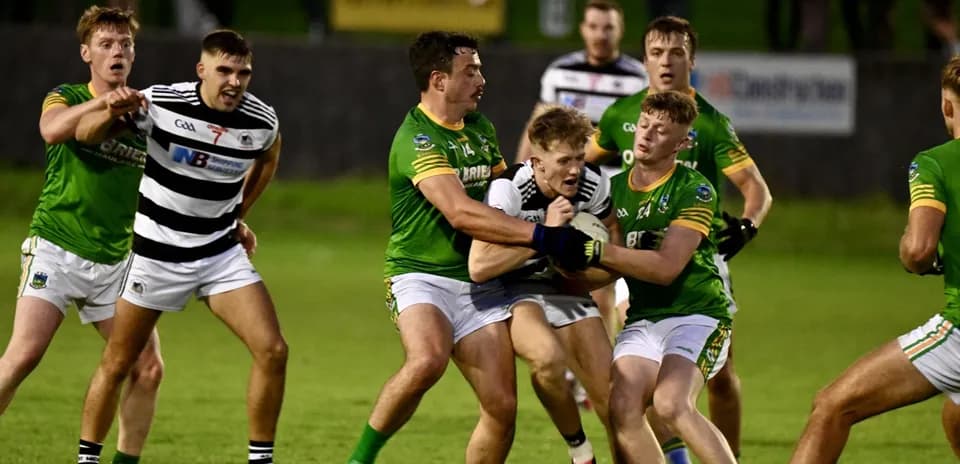 Players in action during a competitive Gaelic football match
