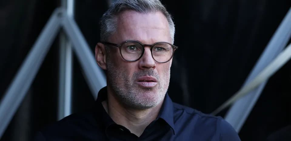 Man with glasses looking intently outdoors