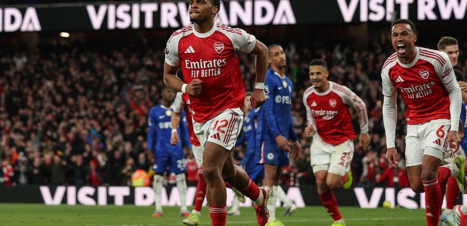 Arsenal players celebrating a goal against Chelsea