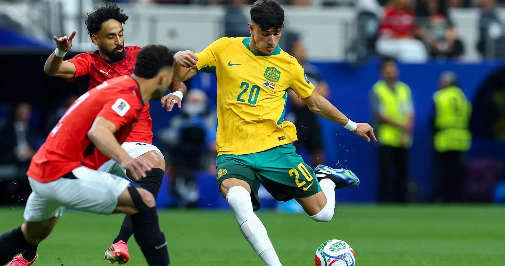 Player from Australia kicking the ball against Egypt
