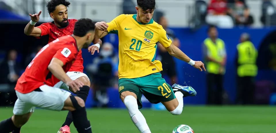 Player from Australia kicking the ball against Egypt