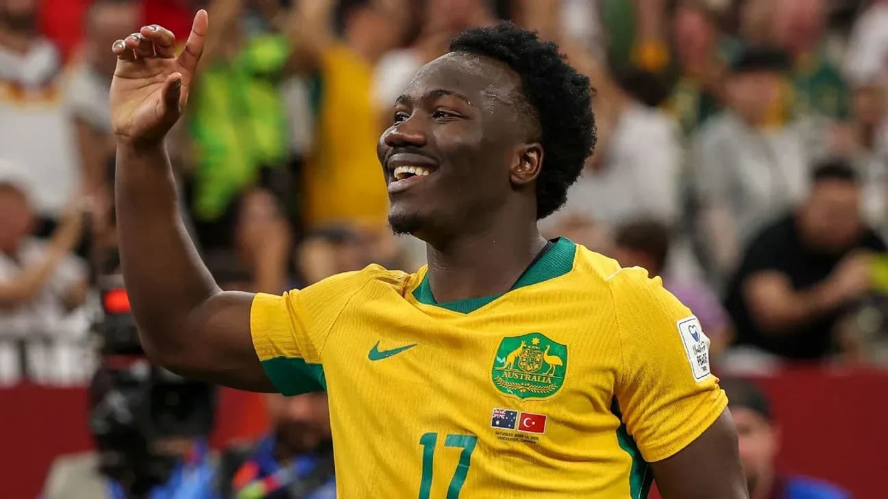 Player celebrating during a match in yellow jersey