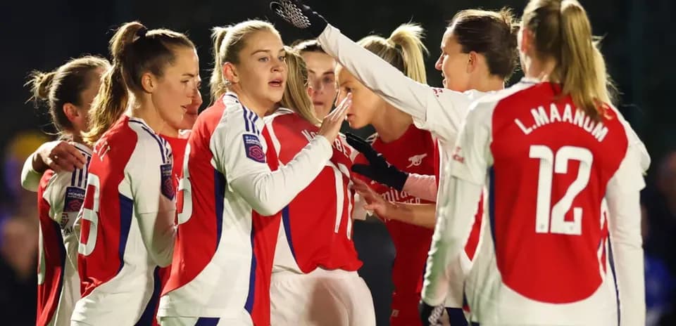Arsenal W players celebrating during the match