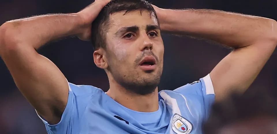 Player holding head in distress during match