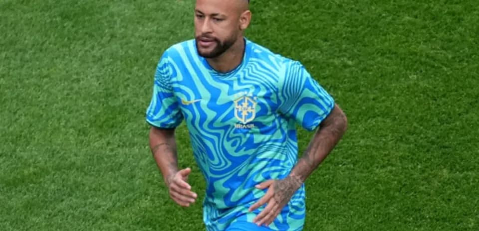 Player in Brazil kit running on the field