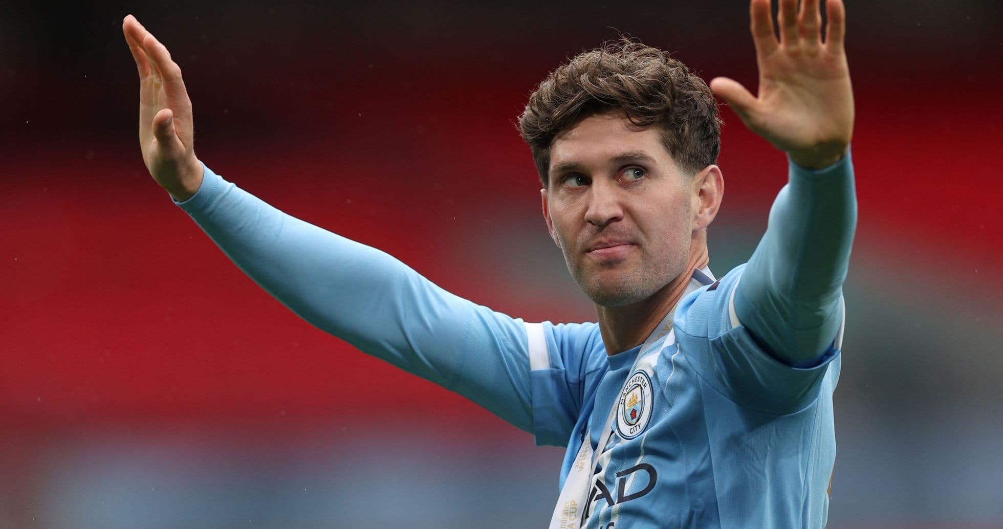 Player waving to fans after the match