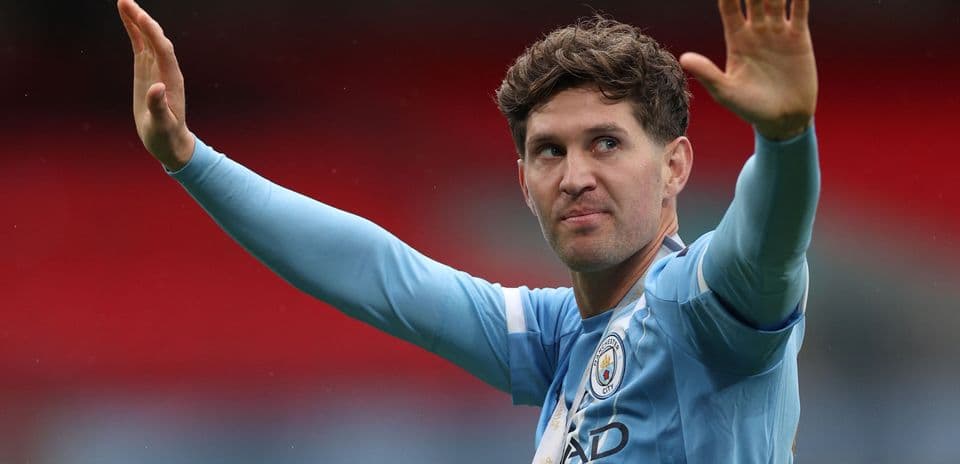 Player waving to fans after the match