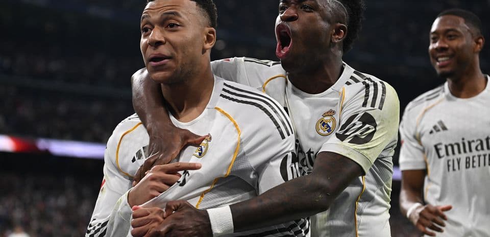Real Madrid players celebrating a goal