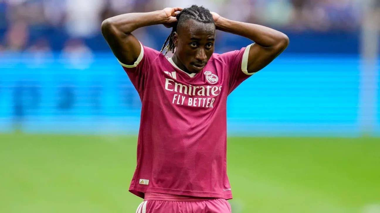 Player in pink jersey reacting during match