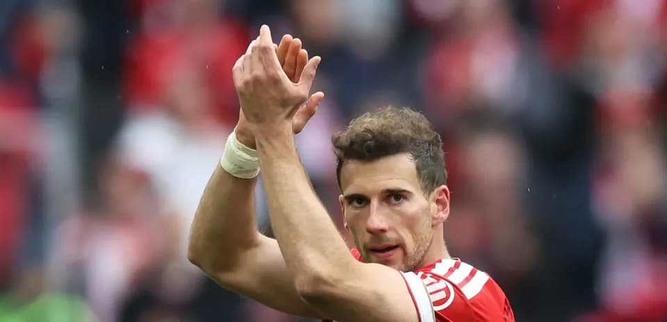 Player applauding fans after match conclusion