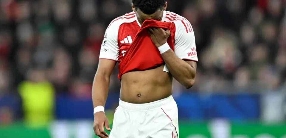 Player pulling shirt over face during match