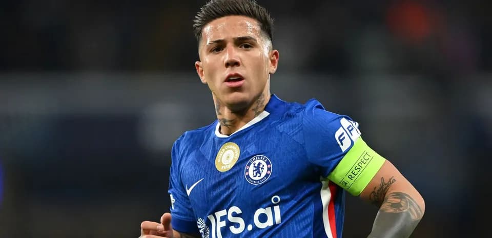 Player in blue Chelsea kit with captain's armband