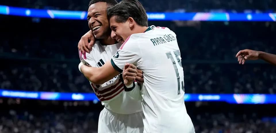 Real Madrid players celebrating a goal