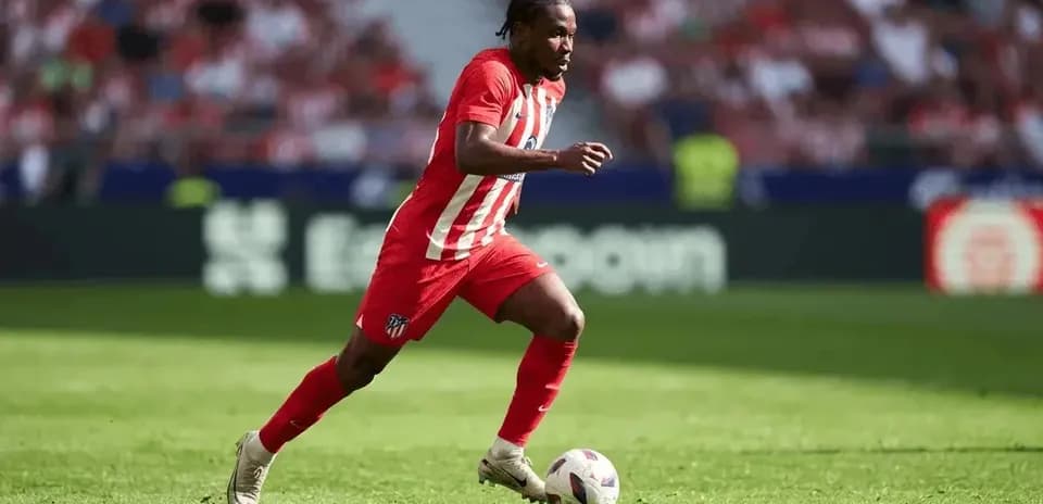 Player running with ball during a match
