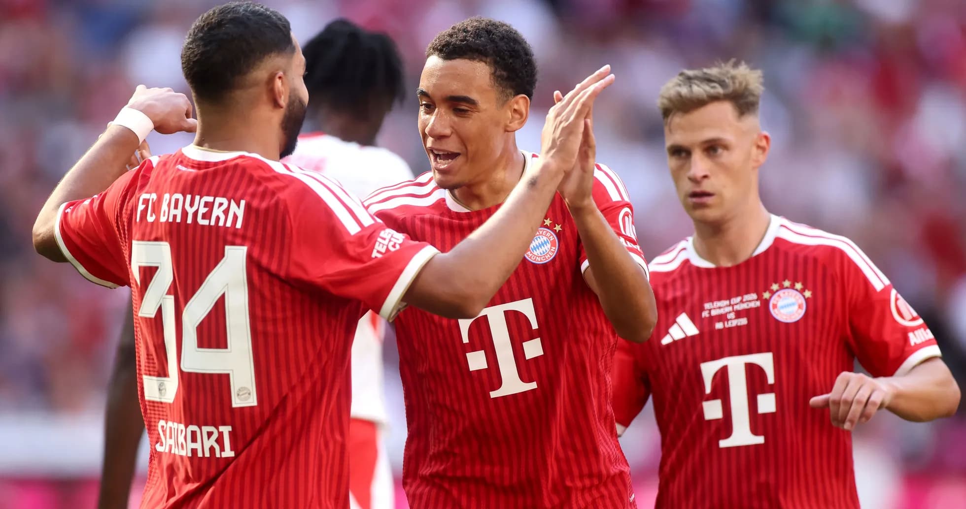 Bayern Munich players celebrating a goal together