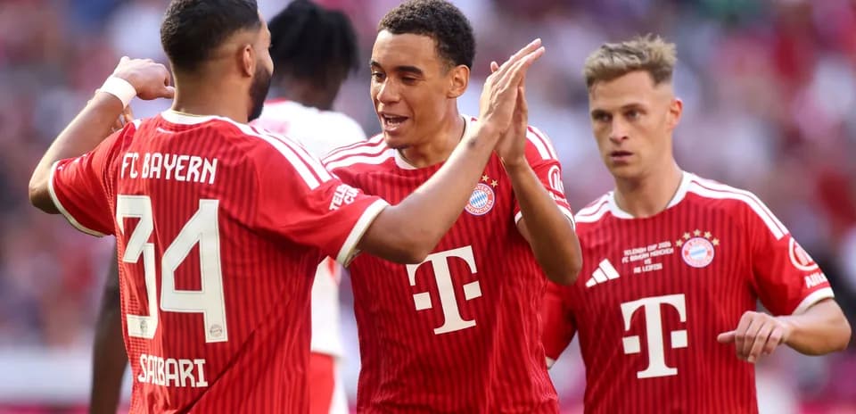 Bayern Munich players celebrating a goal together