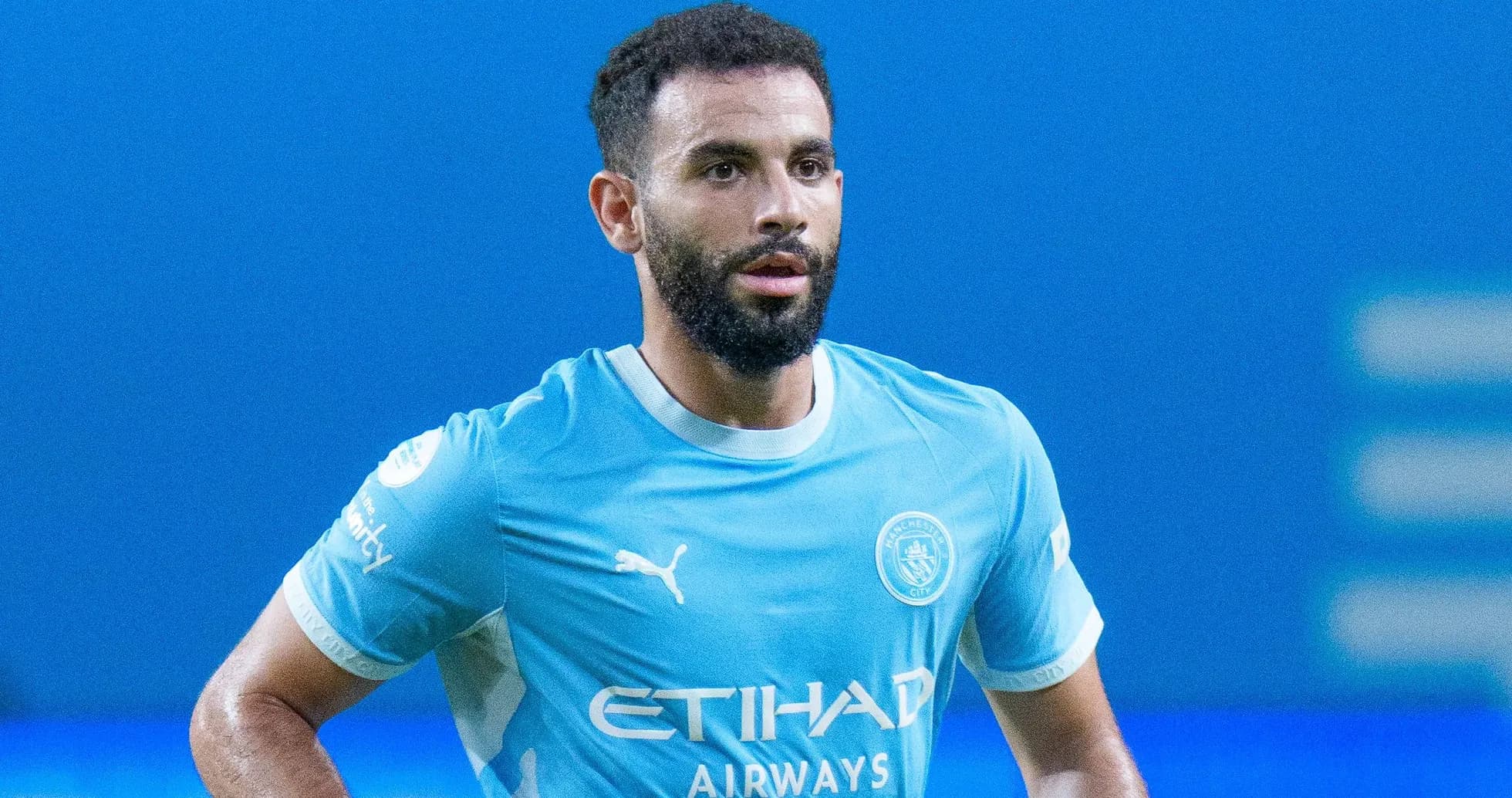 Player in Manchester City jersey on the field
