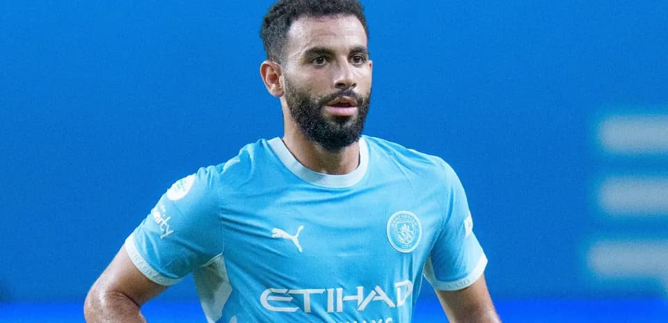 Player in Manchester City jersey on the field