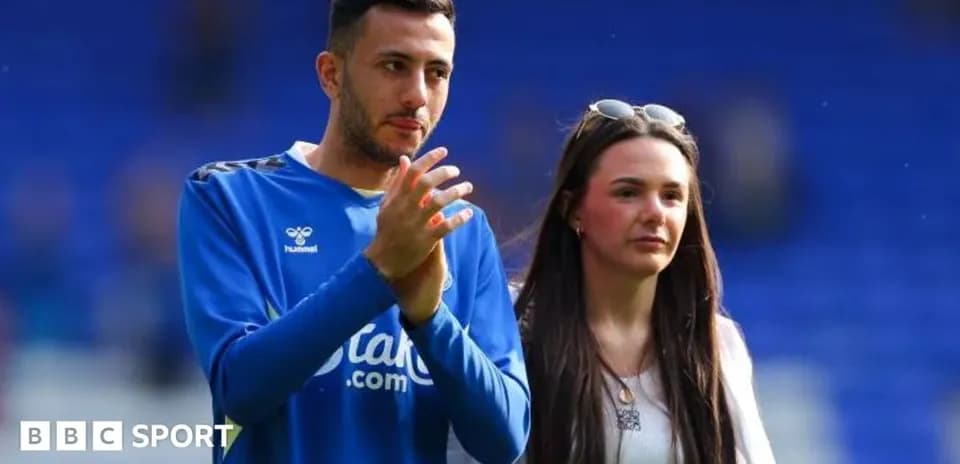 Football player and companion on the pitch