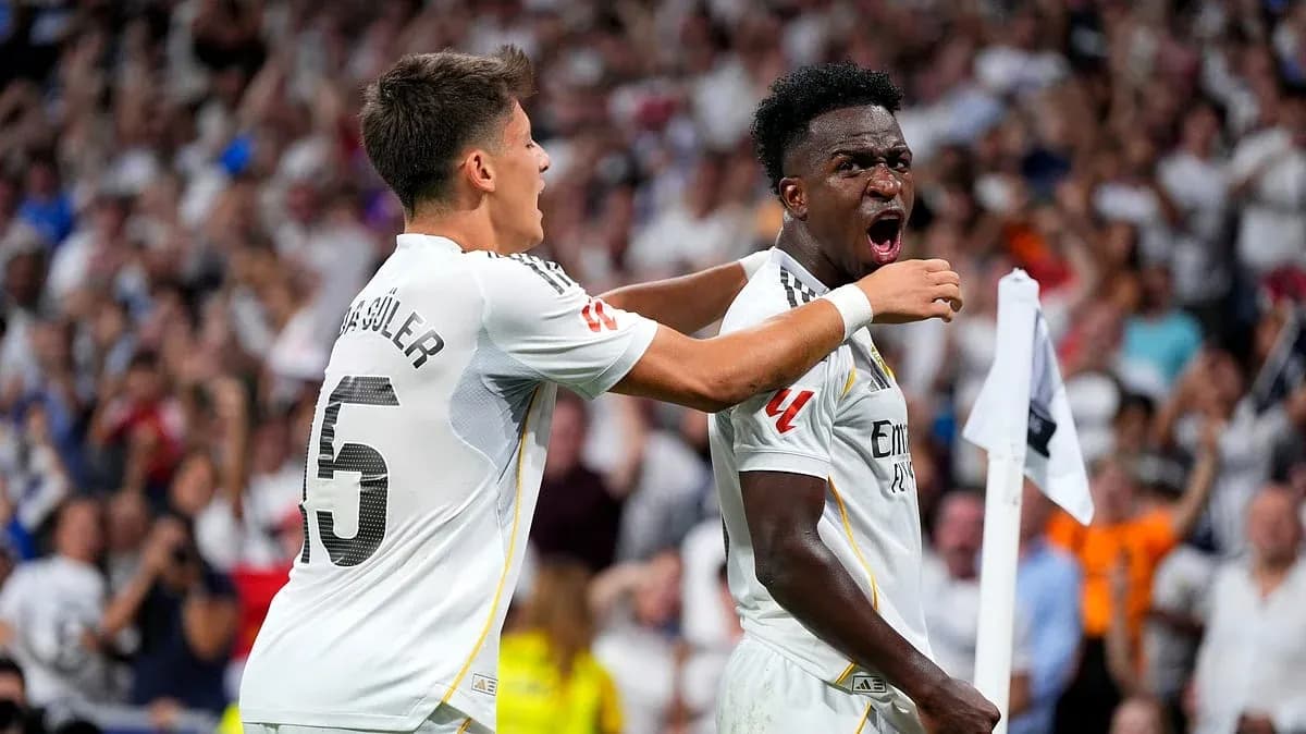 Vinicius celebrating with teammate after scoring