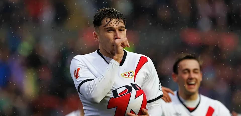 Player celebrating with ball after scoring a goal