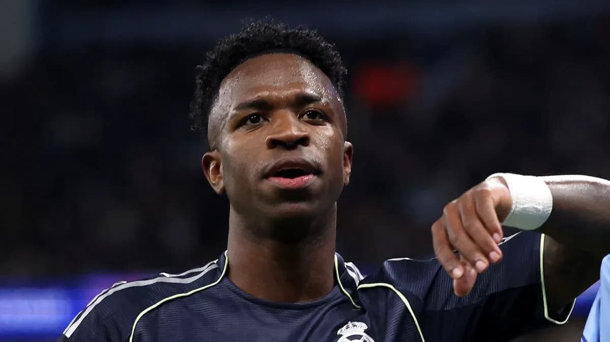 Player gesturing during a match with Real Madrid