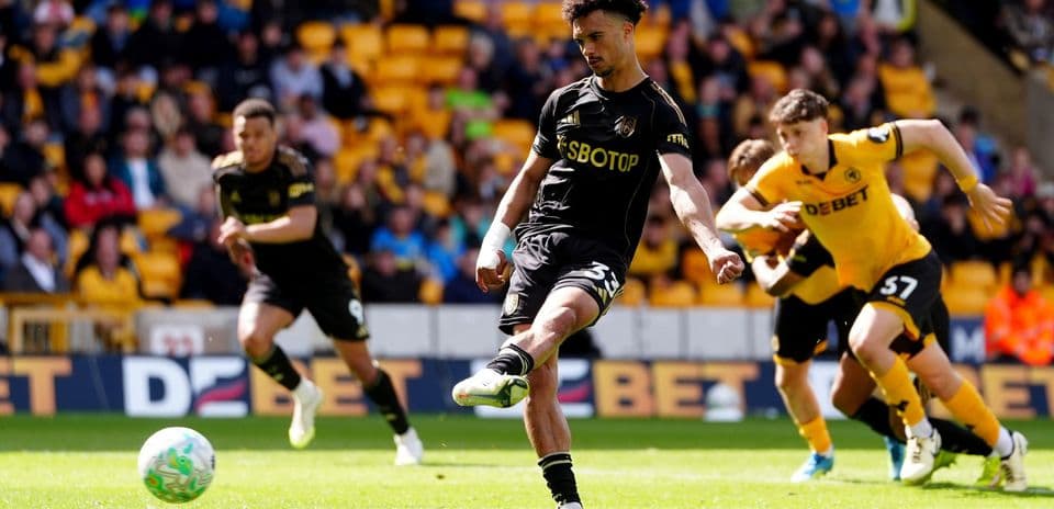 Wolverhampton player taking a penalty kick
