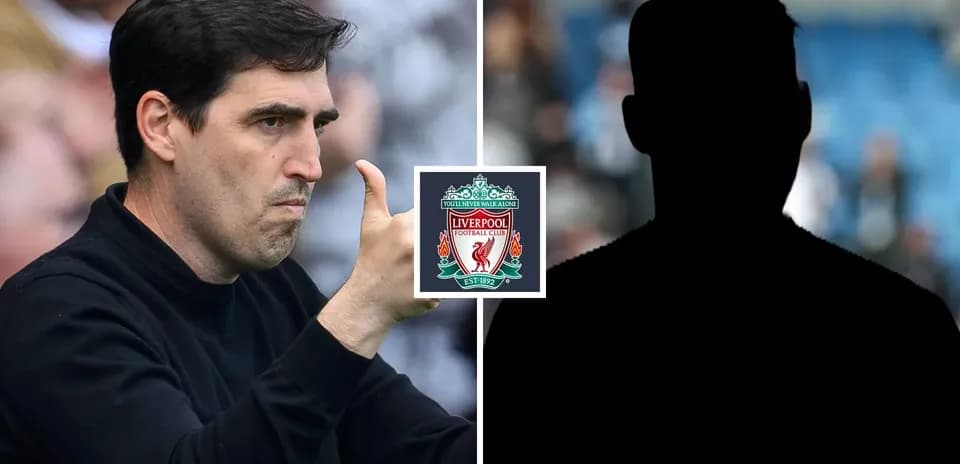 Coach gesturing during match alongside Liverpool logo