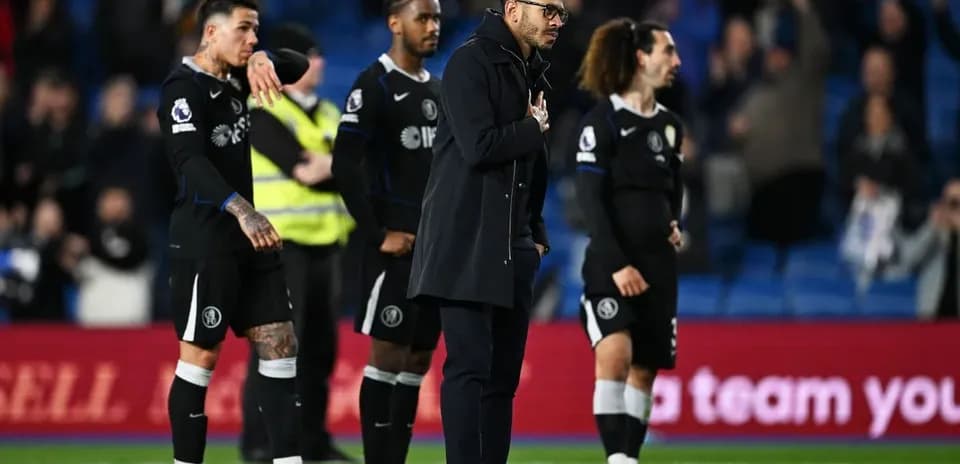 Players and coach acknowledging fans after match