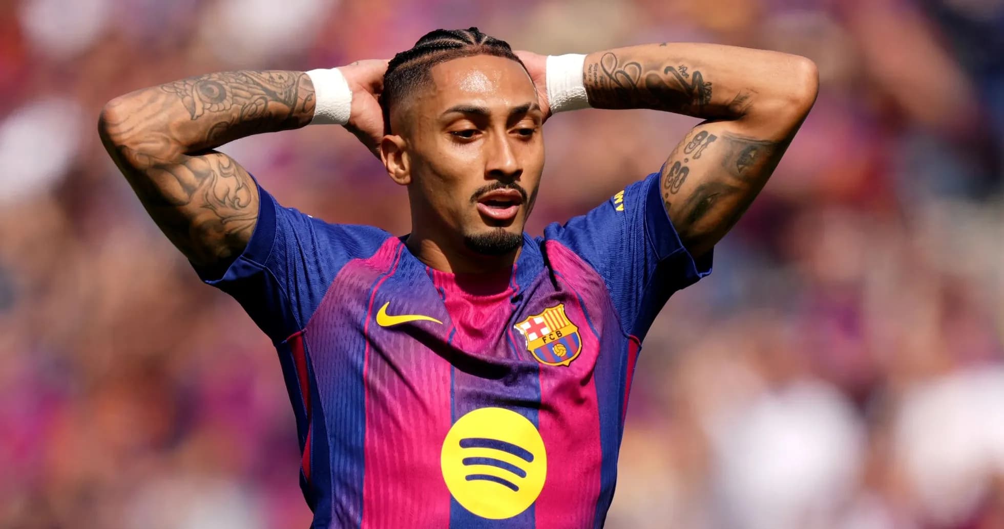 Player with braided hair during match celebration