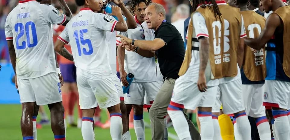 Haiti players hydrating during World Cup match
