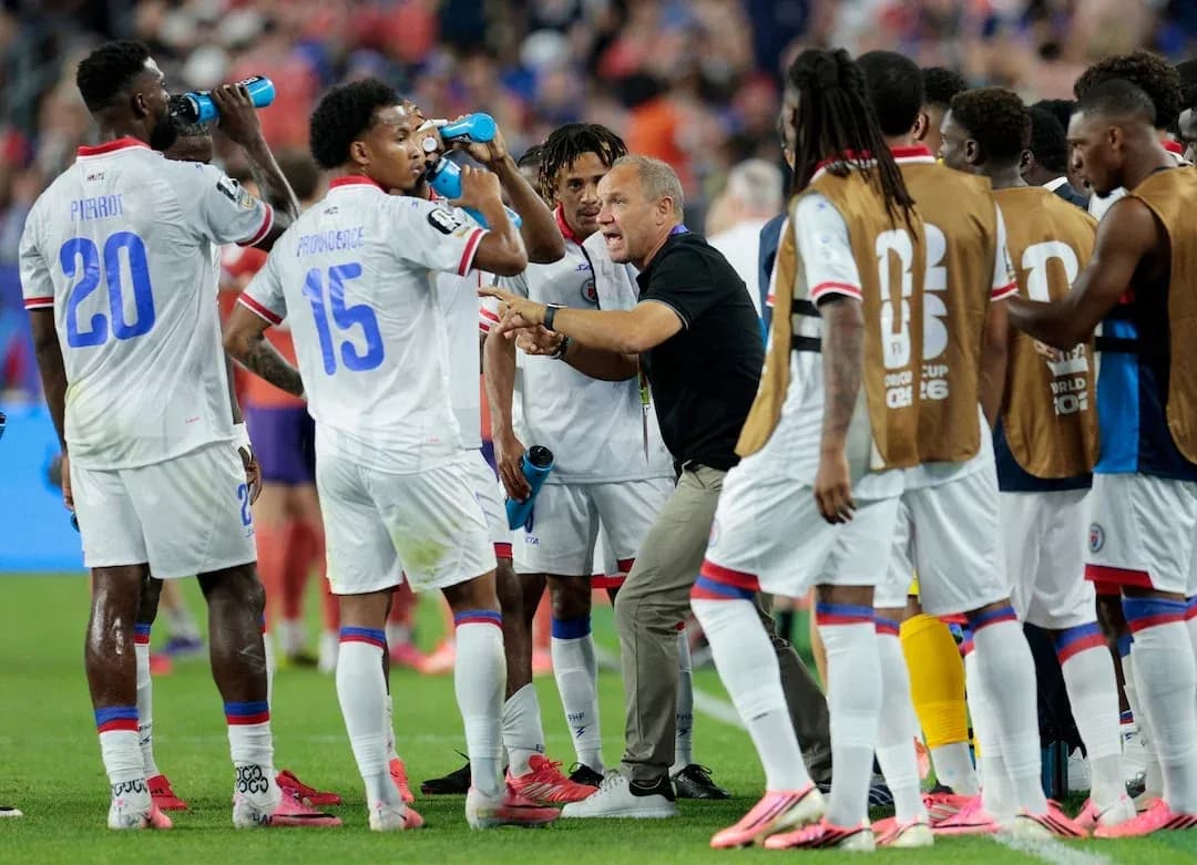 Haiti players hydrating during World Cup match