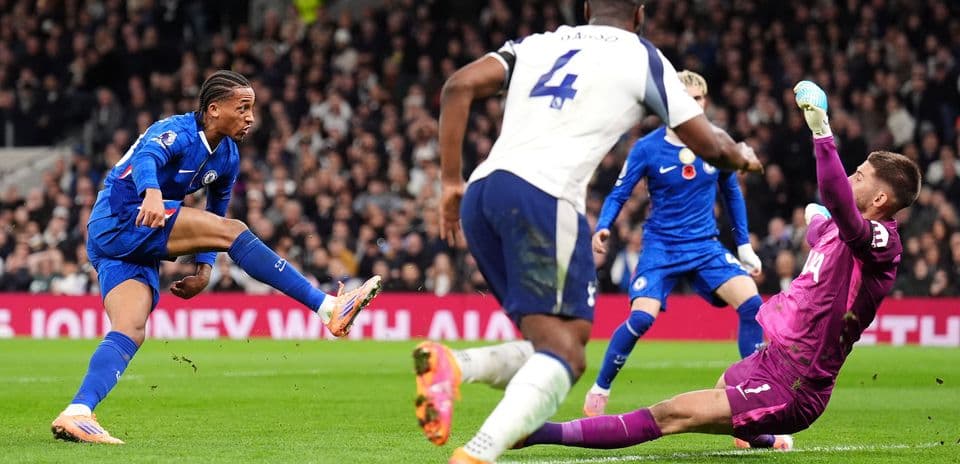 Chelsea player shooting on goal against Tottenham