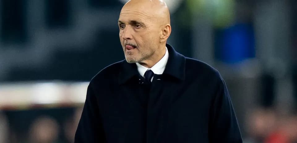 Coach walking on the sidelines during a match