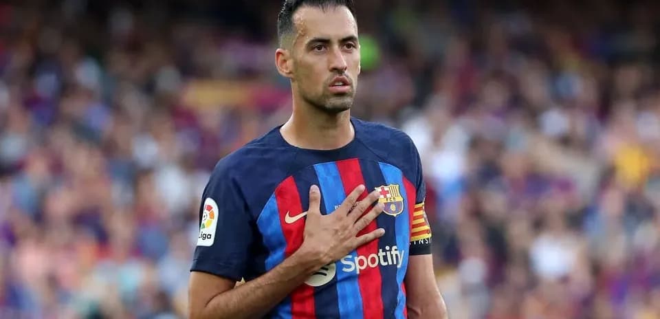 Player with hand on chest during match moment