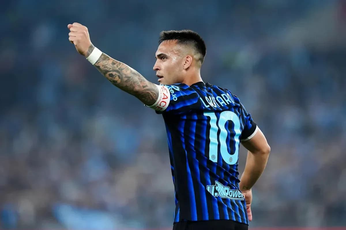 Player gesturing during match in blue striped jersey