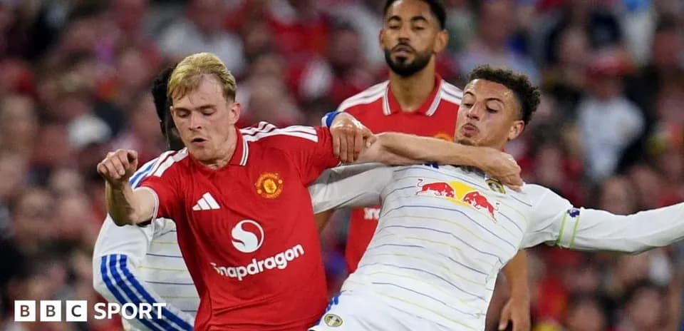 Players contesting for the ball during match action