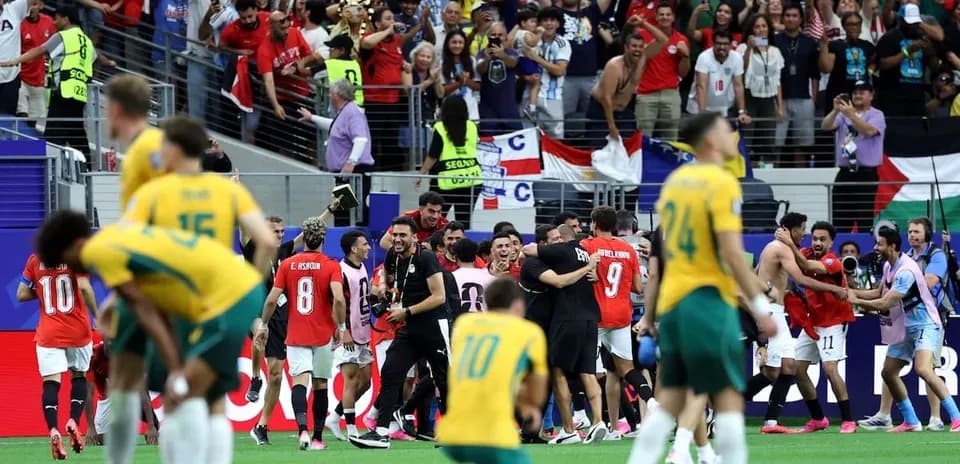 Players celebrating with fans after a match