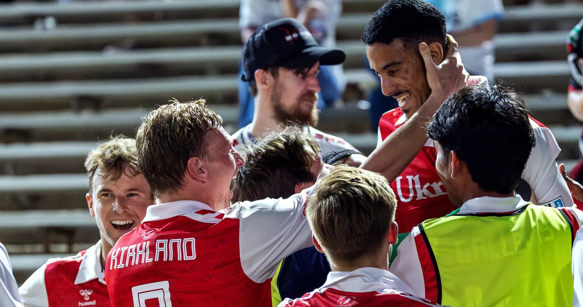 Players celebrating a goal during match
