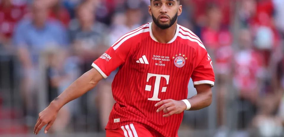 Player in red Bayern Munich kit during match