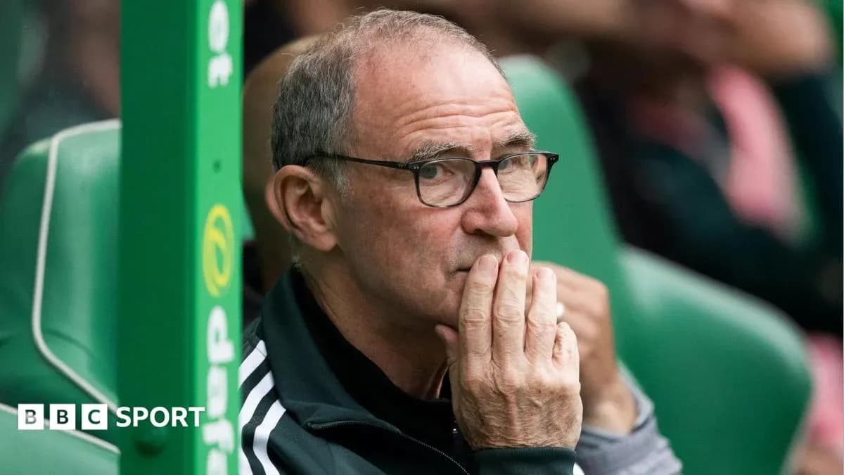 Coach observing from the sidelines during a match