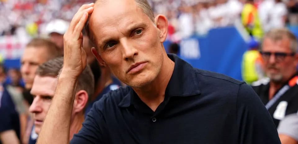 Coach observing the match from the sidelines