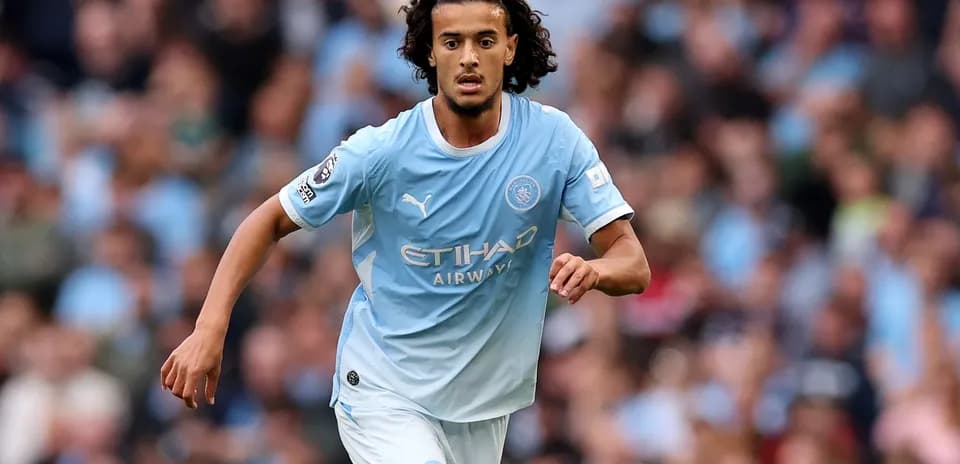 Player running during a Manchester City match